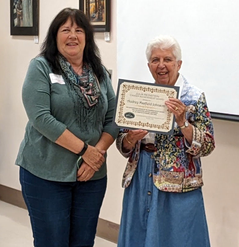 GAHWNY Executive Council Chair and Wyoming County Historian, Cindy Amrhein, presenting the Julia Reinstein Career Achievement Award to Pittsford Town and Village Historian Audrey Maxfield Johnson.